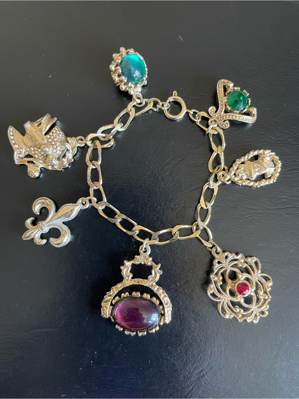 Vintage gold  Tone Fleur De Lis rhinestone Charm Bracelet.